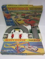 A boxed Matchbox Superfast SF5 Double Track Race Set and M2 Motorised Motorway Set (2, no cars,