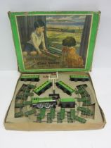 A boxed Chad Valley 0 gauge Clockwork Southern Passenger Set, comprising tinplate 0-4-0 locomotive