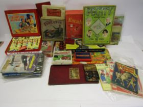 A collection of early-mid 20th Century games, books, annuals and ephemera including Merit