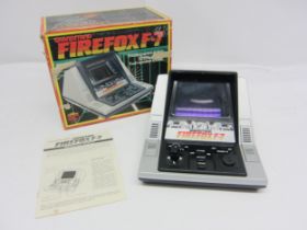 A boxed Grandstand Firefox F-7 electronic video game