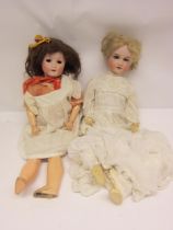 Two early 20th Century German bisque head dolls on articulated wood and composition bodies, to