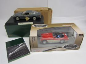 Two boxed 1:18 scale diecast cars to include Guiloy Aston Martin DB7 with paperwork and ERTL Grandes