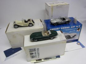 Three Franklin Mint 1:24 scale diecast cars to include 1961 Jaguar E Type, 1938 Jaguar SS-100 and