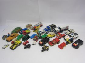 Assorted plastic and pressed steel model vehicles including Tonka trucks and racing cars, Triang
