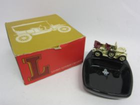 A boxed Lesney Veteran Car Gifts ceramic ashtray, mounted with diecast metal Daimler, Queen's