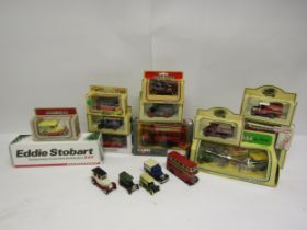 A collection of boxed diecast vehicles to include Corgi Thornycroft Bus, Lledo Days Gone and Atlas