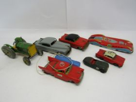 A collection of loose and playworn tinplate toy vehicles, assorted Japanese, German and British