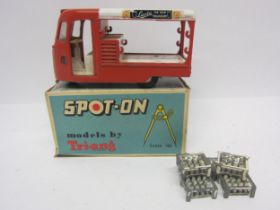A Triang Spot-On 122 diecast model United Dairies Milk Float, red and white body with 'Lacta' decals