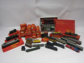 A collection of boxed, loose and playworn Triang 00 gauge model railway locomotives, rolling stock