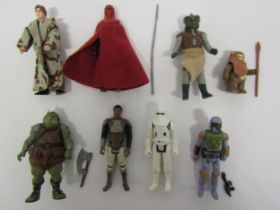 A collection of loose vintage Kenner / Palitoy Star Wars action figures, some with accessories, to