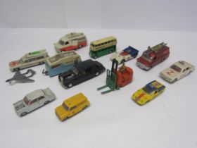 A collection of unboxed playworn Dinky Toys diecast vehicles including Ford Zodiac Police Car, Rolls