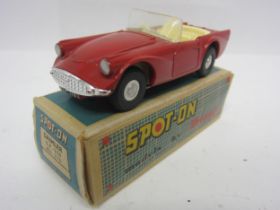 A Triang Spot-On 215 diecast model Daimler SP 250, finished in red with cream interior, in