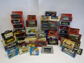 A collection of boxed/cased diecast model vehicles and sets, mostly 1:43 scale, including Corgi