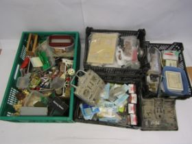 A large collection of model makers spares including boxed servos, ship fittings, figures, unfinished