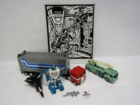 Four playworn vintage Hasbro/Takara Transformers to include Optimus Prime, Air Raid, Jumpstart and