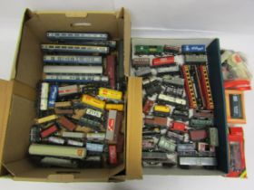 A collection of loose and playworn 00 gauge rolling stock and spares including Hornby, Triang,