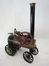 A scratch built live steam model of a portable engine, the brass horizontal boiler with sight