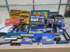 A large collection of boxed, loose and playworn Hornby Dublo 00 gauge model railway rolling stock,