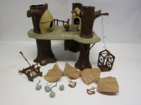 An unboxed vintage Star Wars Return Of The Jedi Ewok Village Playset (incomplete), together with
