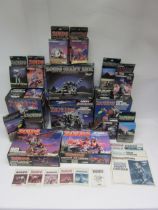 A collection of 1980s Tomy Zoids part constructed figures, loose mixed components, instruction