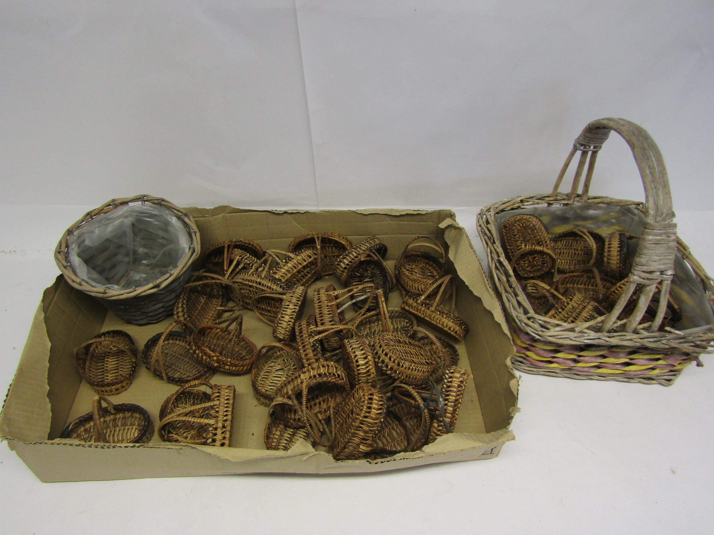 A collection of miniature wicker baskets