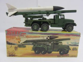 A boxed Dinky Toys diecast 665 Honest John Missile Launcher with missile