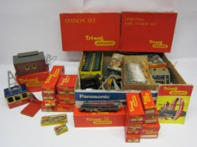 A collection of boxed and loose Tri-ang 00 gauge model railway rolling stock, sets and accessories