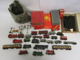 A collection of playworn 00 gauge locomotives, rolling stock, track and accessories including Hornby
