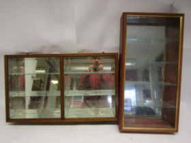 Two small mounting collectors display cabinets, one with open front, mirrored interior and glass