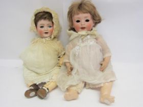 Two early 20th Century German bisque head dolls to include Simon & Halbig 126 with brown wig,