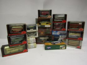 A collection of boxed Corgi and EFE diecast buses, trams and commercial vehicles (19, storage wear