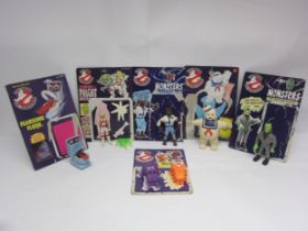 A collection of Kenner 'The Real Ghostbusters' plastic action figures with original backing cards,