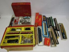 A collection of boxed and loose 00 gauge locomotives, rolling stock and spares including Triang,