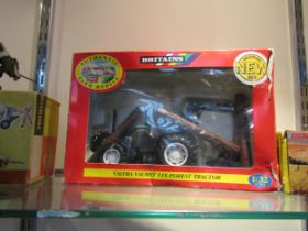 A boxed Britains 1:32 scale diecast Valtra Valmet 115 Forest Tractor (box torn)
