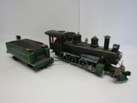 A Bachmann G Scale 4-6-6 locomotive and tender in green Atchison Topeka & Santa Fe livery