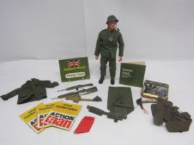 An unboxed Pedigree 'Tommy Gunn' soldier action figure wearing green helmet, gaiters and fatigues,