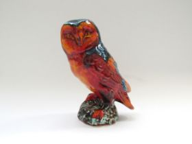 An Anita Harris Pottery figure of an owl in multi coloured glazes. Marks to the base. 18cm high