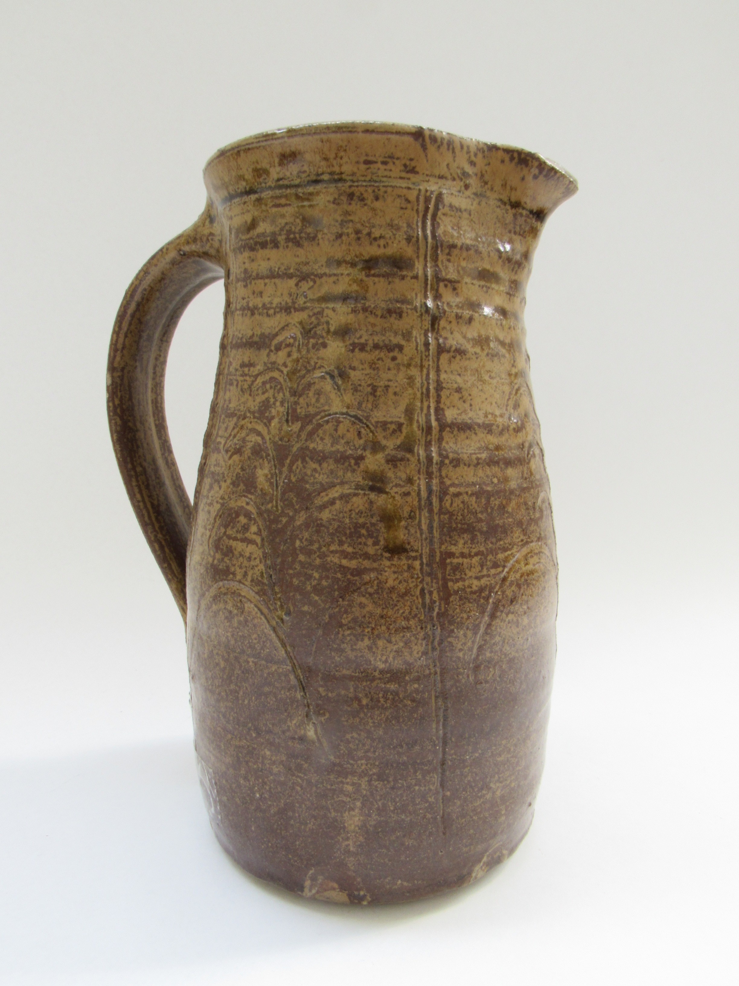A studio pottery jug in the Leach tradition, incised detail in mottled brown glaze. Incised mark - Image 2 of 5