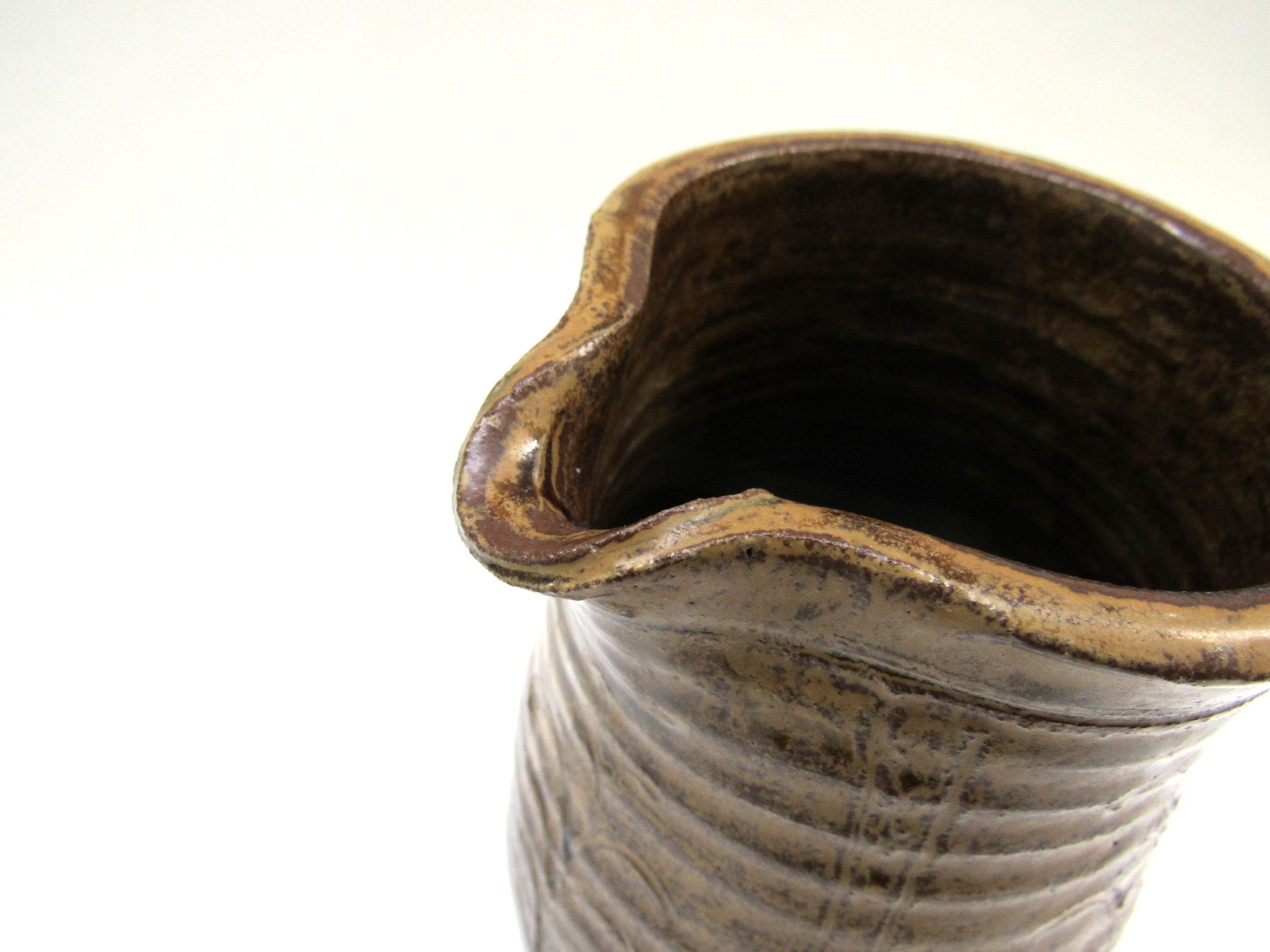 A studio pottery jug in the Leach tradition, incised detail in mottled brown glaze. Incised mark - Image 4 of 5