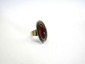 A Mid Century Danish silver and orange stone set ring by 'NE From'. Size P