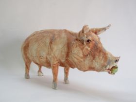 An Ostinelli & Priest studio pottery figure of a Pig. Impressed seal to back leg. 22.5cm high x 43cm
