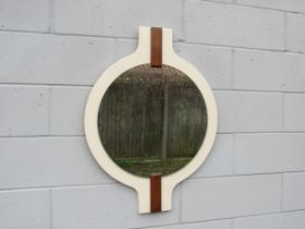 A 1970s large circular wall hung mirror with teak and cream wood frame, possibly Italian. 88cm x