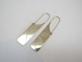 A pair of 1970's/80's large white metal 'Paperclip' earrings, unmarked.