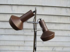 A Danish standard lamp in chromed metal and brown painted finish with twin adjustable spot lights