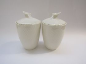 A pair of Belleek porcelain lidded canisters, c1980's mark, 23cm high