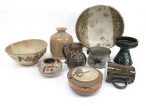 A collection of various studio pottery dishes, vases and jugs etc including Black Mountain, Truro,
