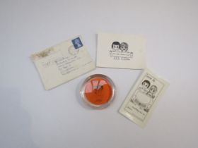 "Love Is" paperweight by Roberto & Kim Casali and hand written card and envelope dated Oct 1972.