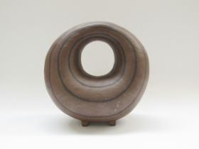 A Michael Cartledge studio pottery sculpture of circular hoop form. 18.5cm high