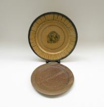 A David Frith studio pottery plate with impressed potters seal and a large studio pottery charger by