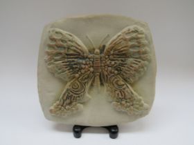 BERNARD ROOKE (b.1938): A studio pottery butterfly wall plaque, 23.5cm diameter
